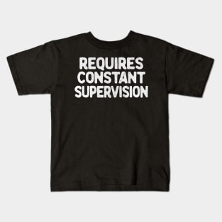 Requires Constant Supervision Kids T-Shirt